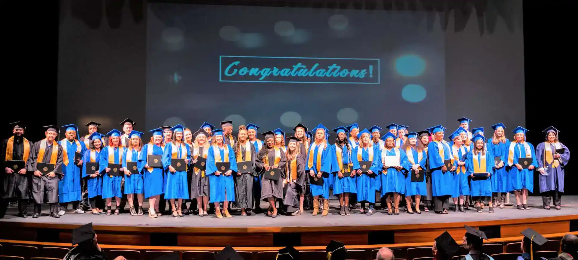 2018 graduates on stage
