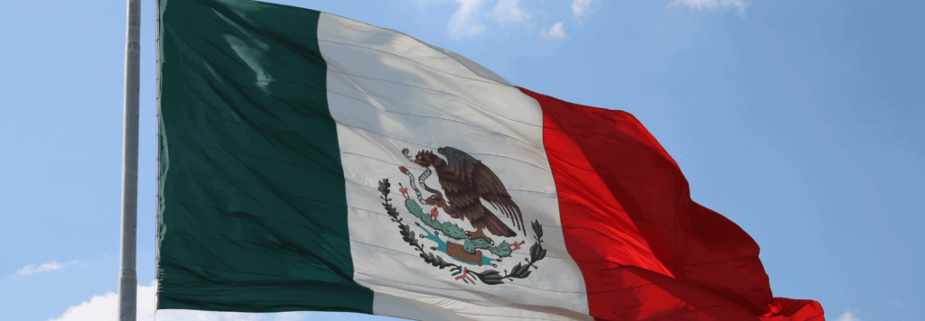 mexican flag waving on flag poll 
