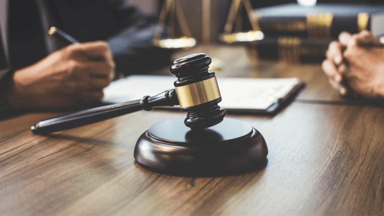 A gavel sitting on a desk