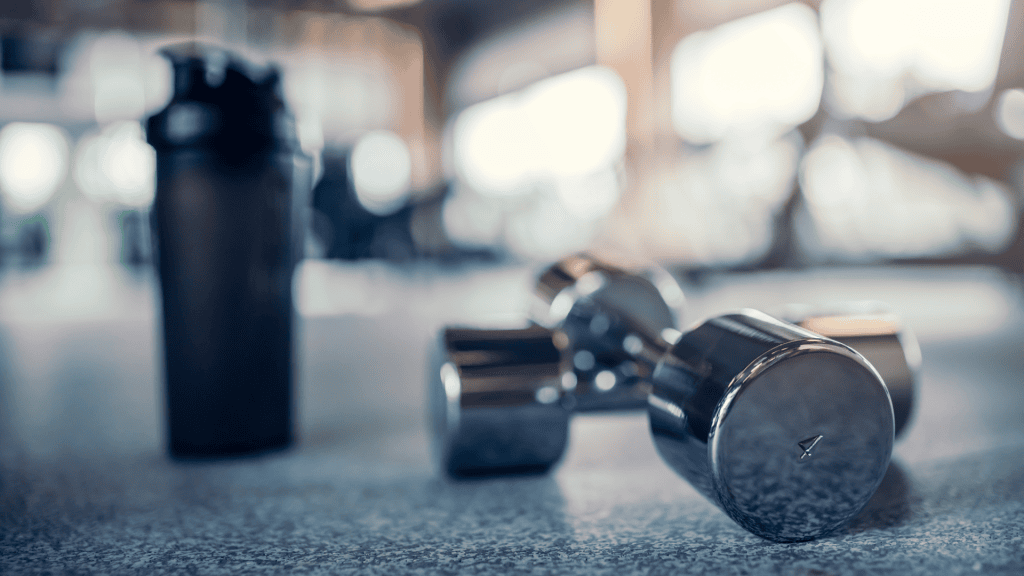 dumbbells on the floor in a gym