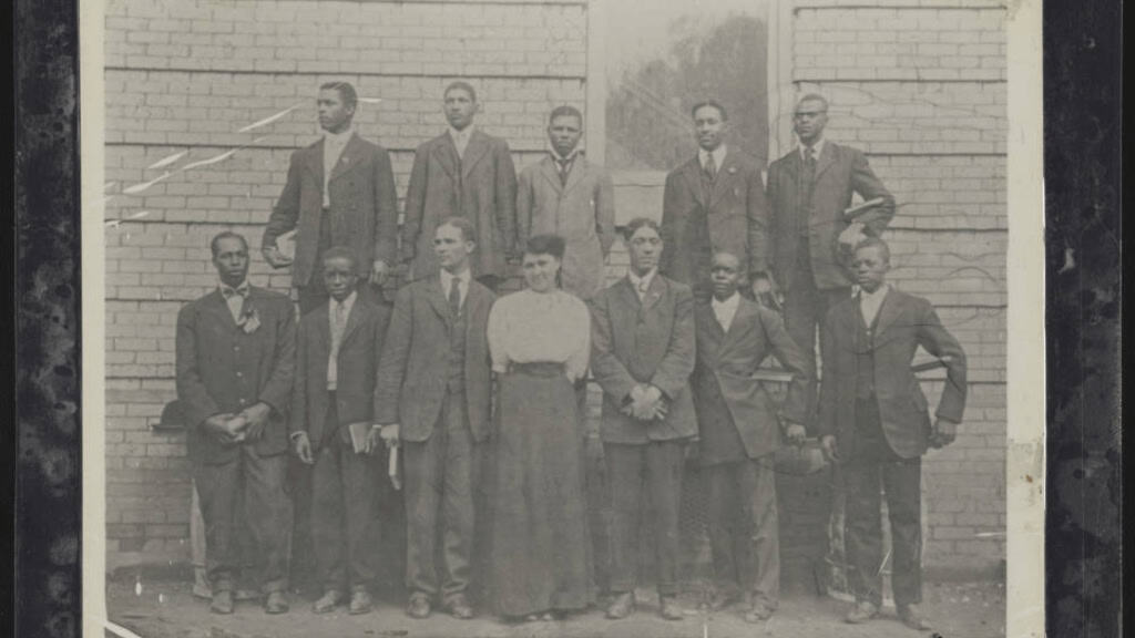 A historic image of a graduating class of African Americans at Lane College in 1913