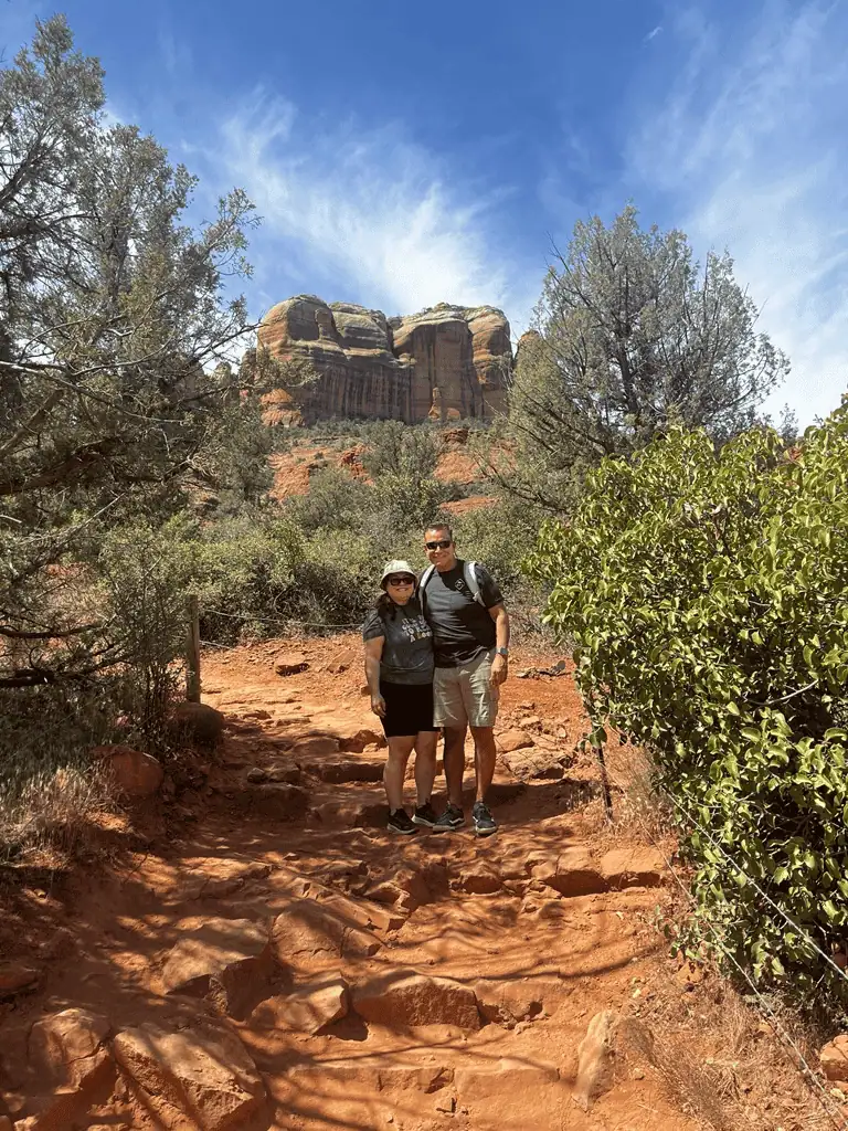 Hiking adventure in Sedona's red rocks showcasing stunning desert landscape and vibrant natural scenery.
