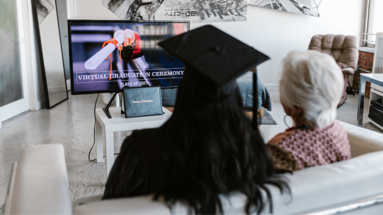 family viewing virtual graduation on television